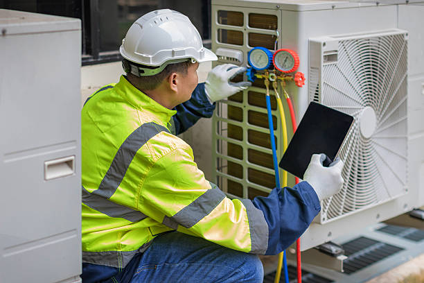 Professional Emergency Hvac Repair technician working in Oakville, CT
